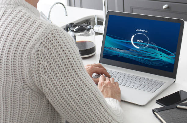 A laptop loading a fictional software update.